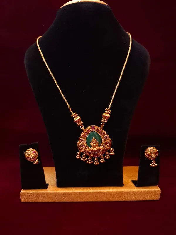 Gold_Metal_Temple_Pendant_Necklace_Set_With_Earrings_For_Women
