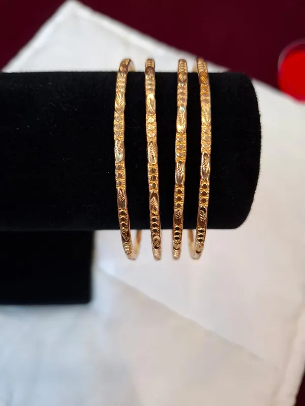 Gold_Metal_Textured_Panchaloham_Bangles_Set_Of_4_For_Women