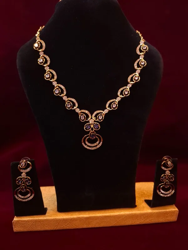 Rose_Gold_Metal_Crystal_Studded_Necklace_And_Earrings_Set_For_Women