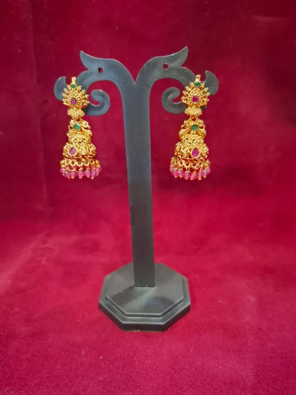 Three-Tier_Gold_Jhumka_Earrings_with_Pink_Hanging_Beads
