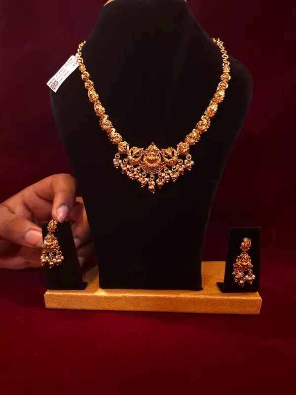 Antique_Gold_Metal_Temple_Lakshmi_Necklace_Set_With_Earrings_For_Women