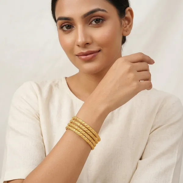 Gold_Metal_Textured_Bangle_Set_Of_4_For_Women