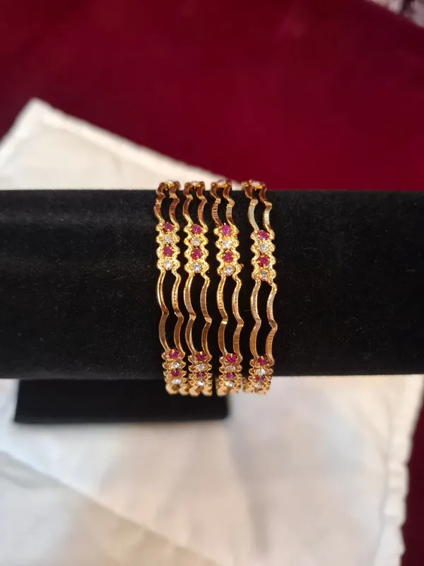 Gold_And_Ruby_Metal_Wave_Design_Bangles_Set_Of_4_For_Women