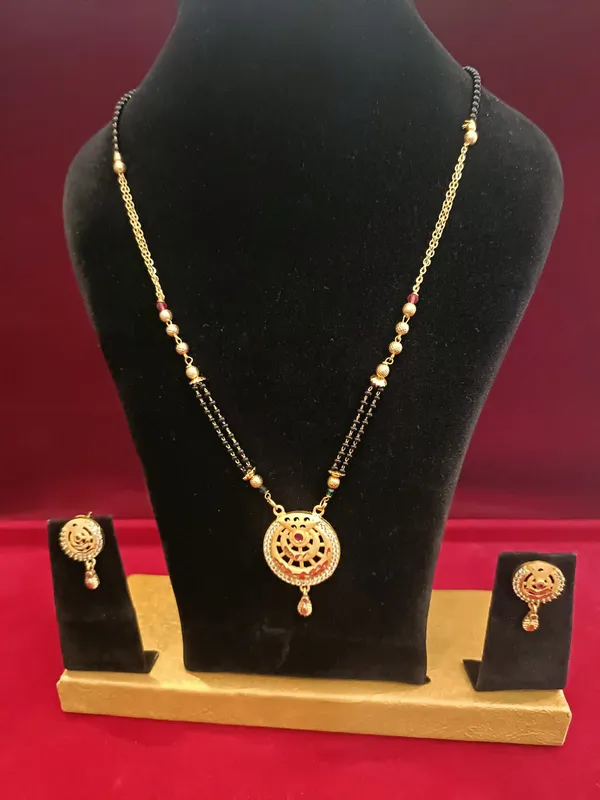 Gold_Metal_Kundan_Mangalsutra_Set_With_Earrings_For_Women