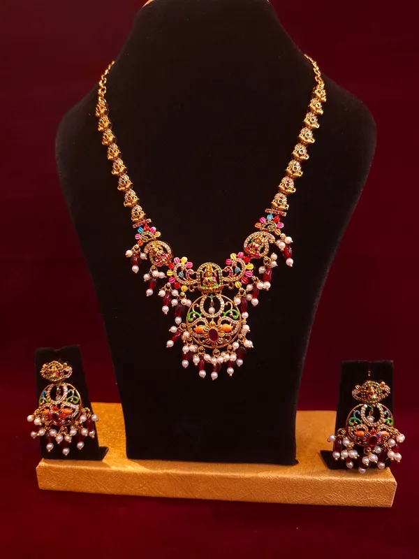 Gold_And_Pink_Metal_Kundan_Pearl_Drop_Necklace_Set_For_Women