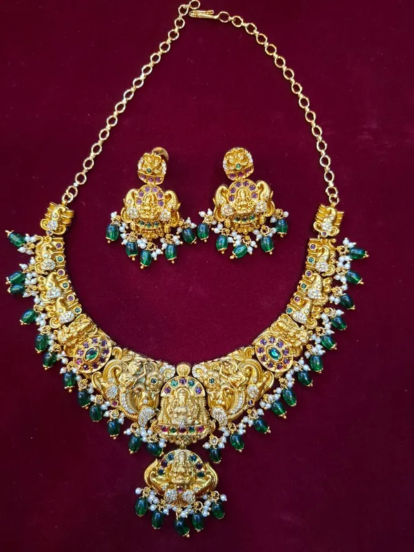 Gold_And_Green_Metal_Kundan_Temple_Necklace_Set_For_Women