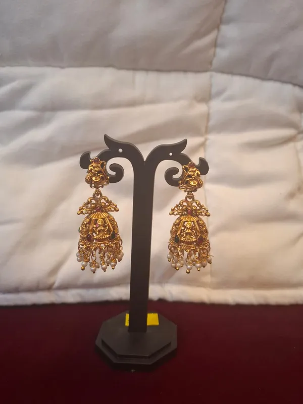 Gold_And_Pearl_Metal_Temple_Design_Jhumka_Earrings_For_Women