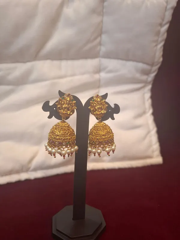 Gold_Pearl_Metal_Textured_Jhumka_Earrings_With_Pearl_Drops_For_Women