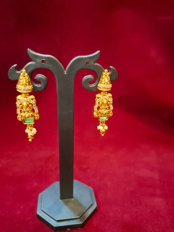 Traditional_Gold_Lakshmi_Temple_Earrings_with_Green_Stone_Accent
