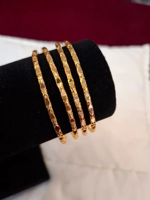 Gold_Metal_Textured_Bangles_Set_Of_4_For_Women