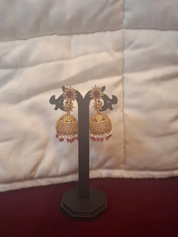 Gold_And_Pink_Metal_Floral_Jhumka_Earrings_For_Women