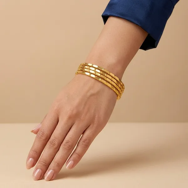 Gold_Metal_Textured_Slim_Bangle_Set_Of_4_For_Women