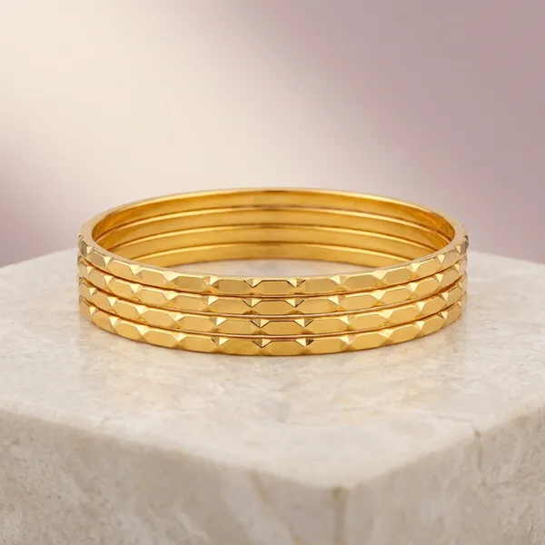 Gold_Metal_Textured_Slim_Bangle_Set_Of_4_For_Women