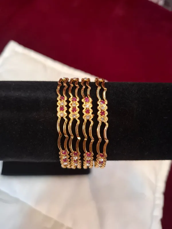 Gold_And_Ruby_Metal_Wave_Design_Bangles_Set_Of_4_For_Women