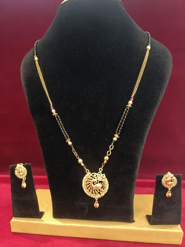 Gold_Metal_Peacock_Pendant_Mangalsutra_Set_With_Earrings_For_Women