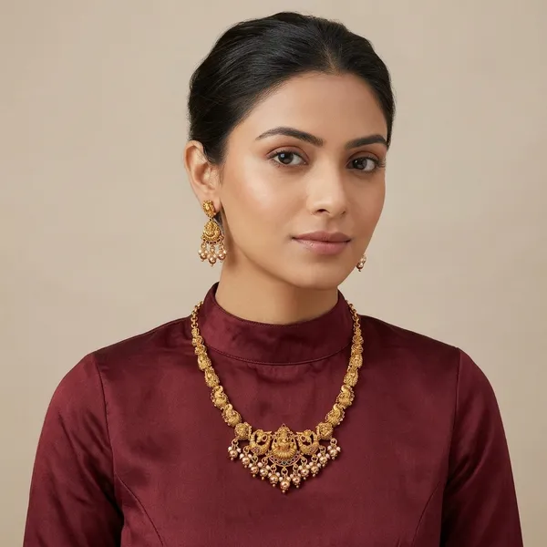Antique_Gold_Metal_Temple_Lakshmi_Necklace_Set_With_Earrings_For_Women