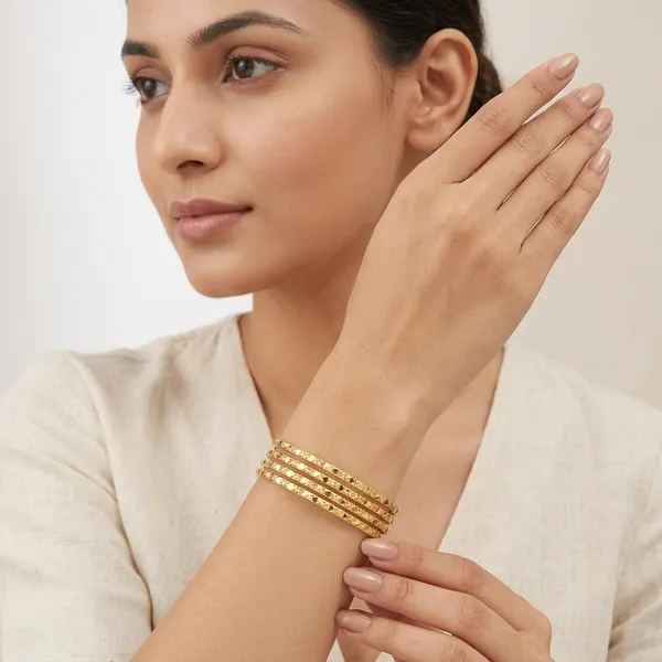 Gold_Metal_Textured_Bangles_Set_Of_4_For_Women