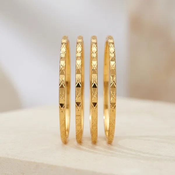 Gold_Metal_Textured_Bangles_Set_Of_4_For_Women