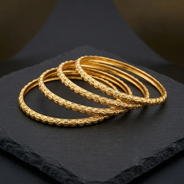 Gold_Metal_Textured_Bangle_Set_Of_4_For_Women