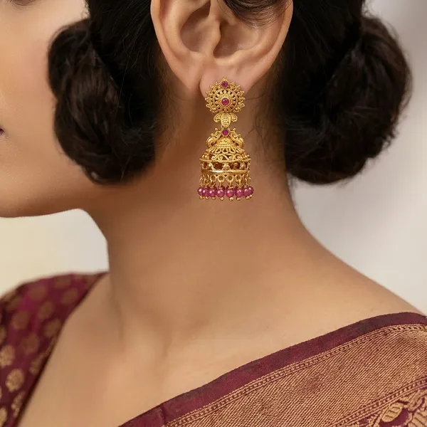 Gold_Antique_Metal_Jhumka_Earrings_With_Red_Beads