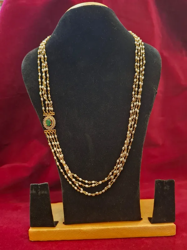 Three-Strand_Pearl_Necklace_with_Green_Stone_Side_Pendant