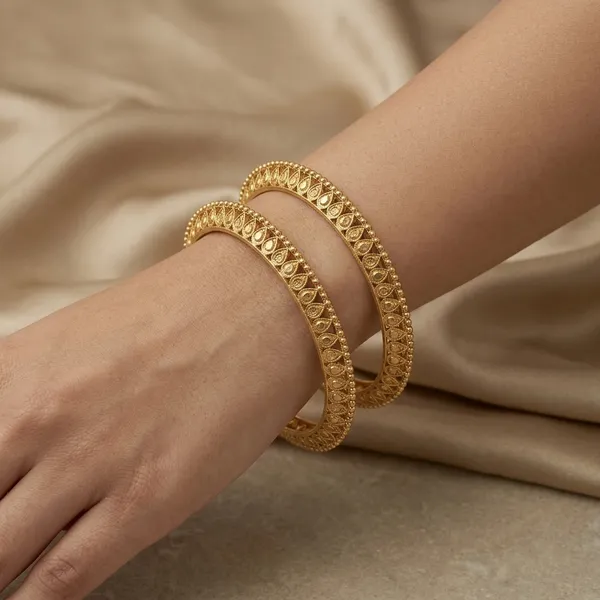 Gold_Metal_Circular_Motif_Textured_Bangles_For_Women