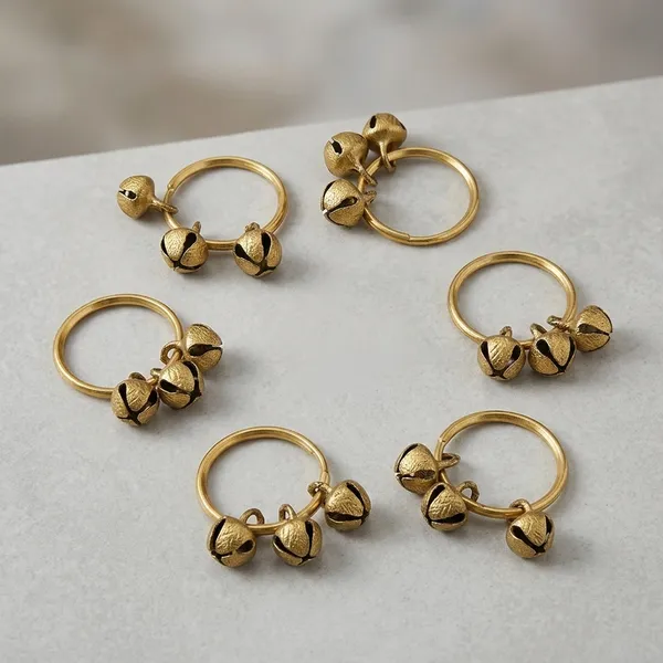 Brass_Festive_Bell_Charm_Golden_Napkin_Rings_Set_Of_6