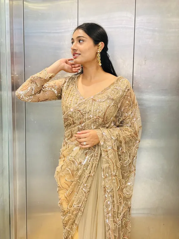 Champagne_Beige_Designer_Net_Saree_with_Heavy_Sequin_&_Thread_Embroidery