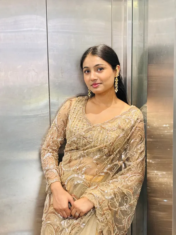 Champagne_Beige_Designer_Net_Saree_with_Heavy_Sequin_&_Thread_Embroidery