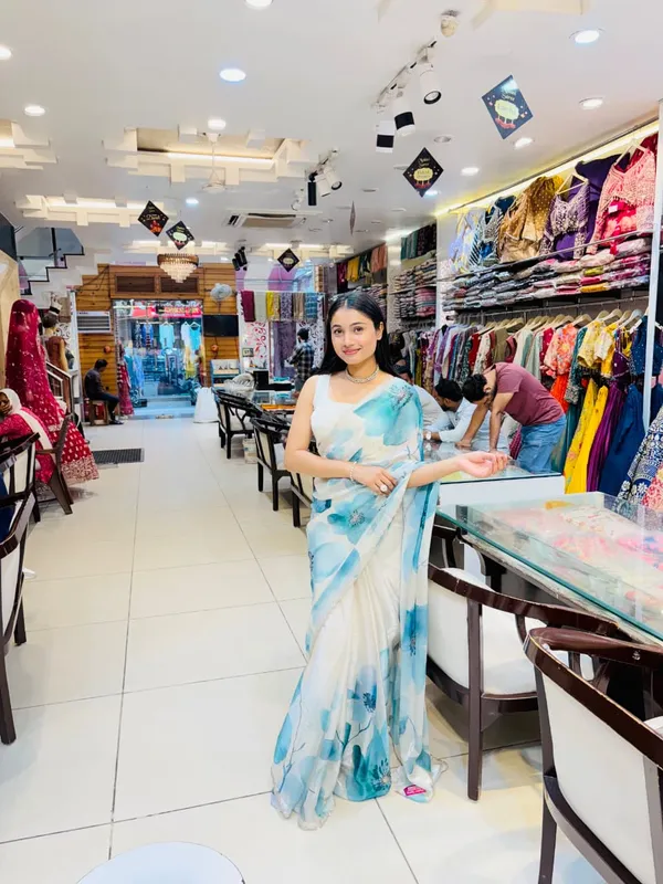Elegant_Sky_Blue_Floral_Organza_Saree_with_Delicate_Sequin_Work