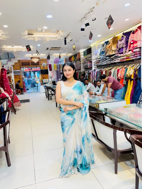Elegant_Sky_Blue_Floral_Organza_Saree_with_Delicate_Sequin_Work