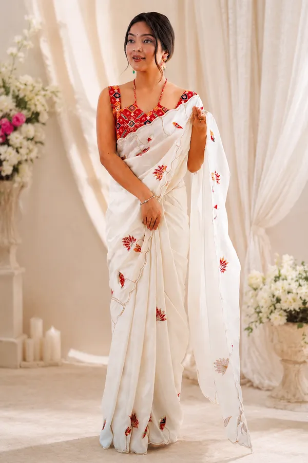 Timeless_Off_White_Organza_With_Statement_Red_Patola_Blouse_Saree