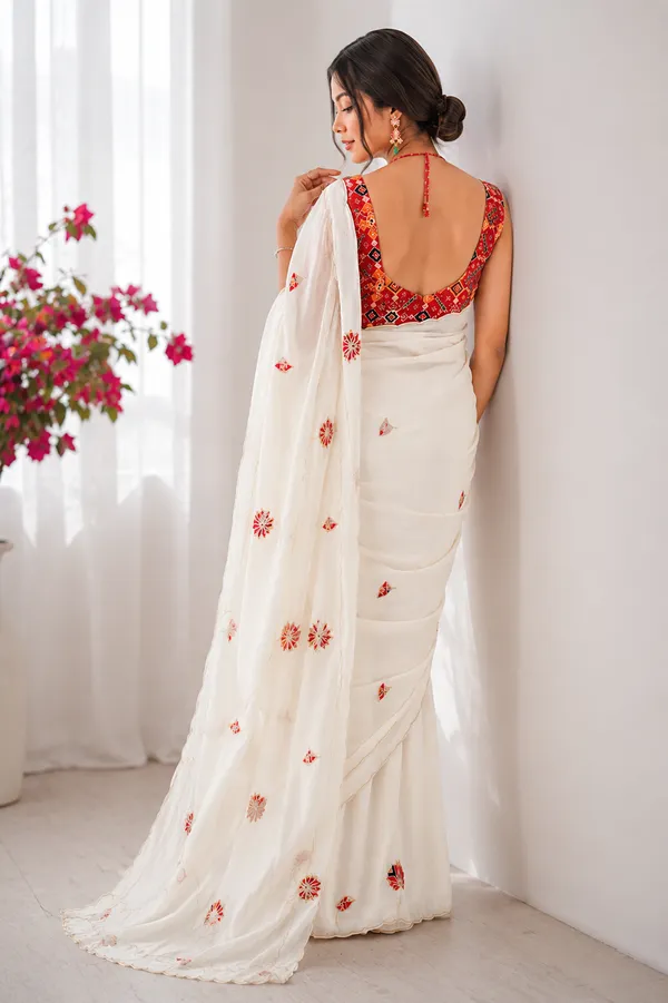 Timeless_Off_White_Organza_With_Statement_Red_Patola_Blouse_Saree
