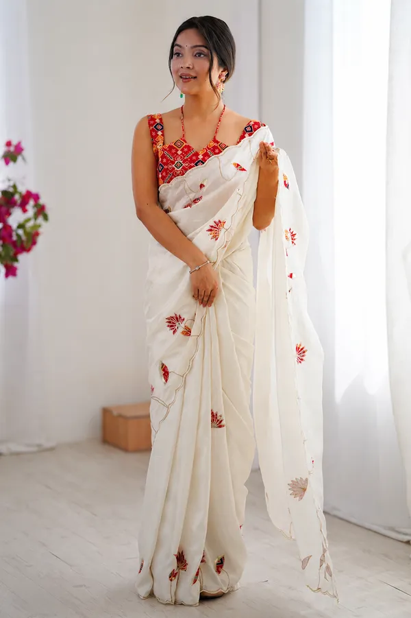 Timeless_Off_White_Organza_With_Statement_Red_Patola_Blouse_Saree