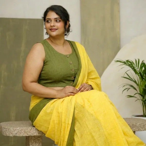Olive_Green_Cotton_Sleeveless_Blouse_with_Button_Detail_for_Women