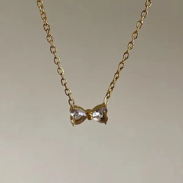 Gold_Brass_Bow_Motif_Pendant_Necklace_For_Women