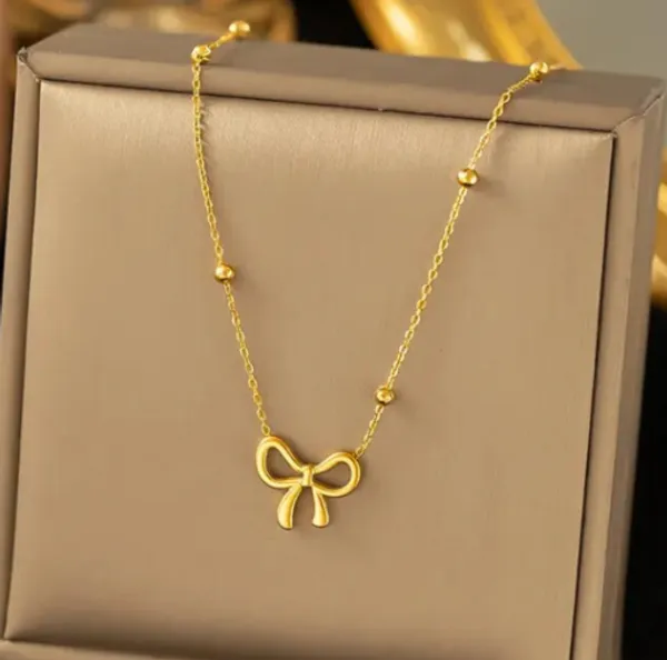 Gold_Brass_Bow_Motif_Necklace_For_Women