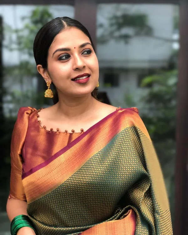 Green_Banarasi_Soft_Lichi_Silk_Saree_For_Women