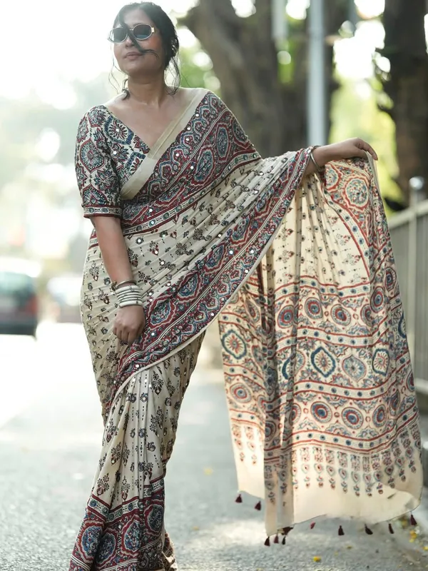 Ivory_Modal_Silk_Ajrakh_Printed_Saree_with_Traditional_Floral_Motifs,_Heritage_Border_&_Tassel_Detailing