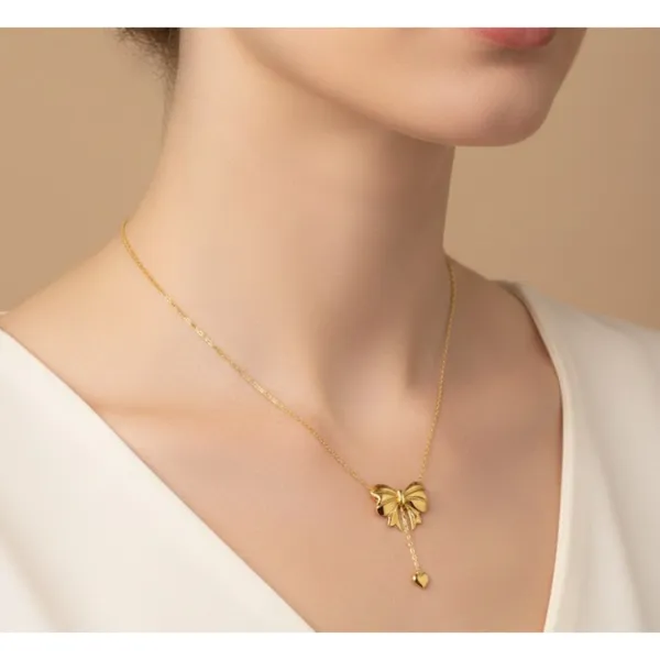 Gold_Stainless_Steel_Bow_Charm_Heart_Drop_Pendant_Necklace_For_Women_(PNSS-20)