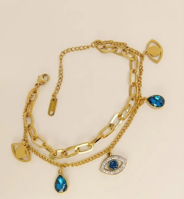 Gold_Stainless_Steel_Blue_Stone_Evil_Eye_Charm_Layered_Bracelet_For_Women_(BRSSCN-04)