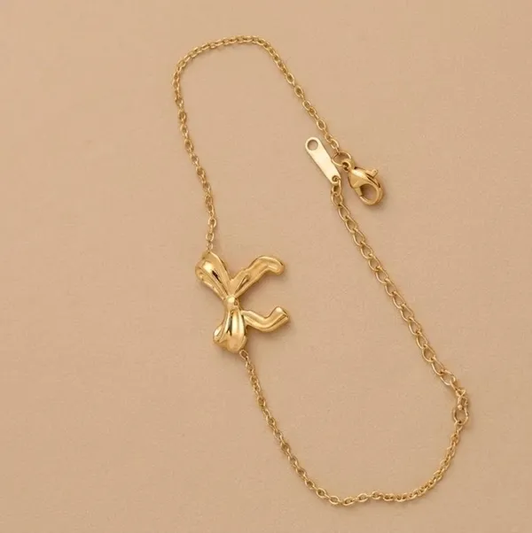 Gold_Stainless_Steel_Balloon_Dog_Charm_Chain_Bracelet_For_Women_(BRSSCN-07)