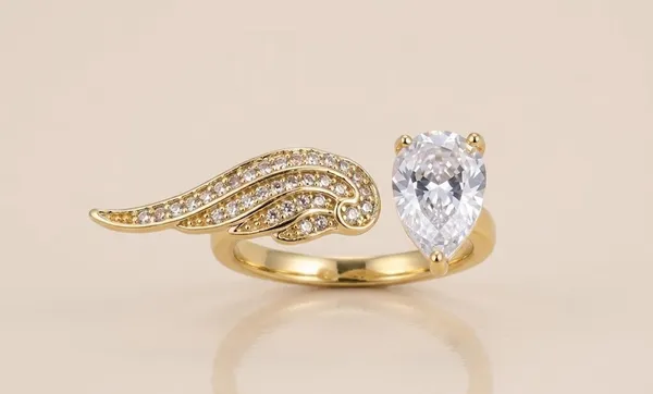 Gold_Stainless_Steel_Angel_Wing_Pear_Cut_Solitaire_Open_Ring_For_Women_(RGSS-26)