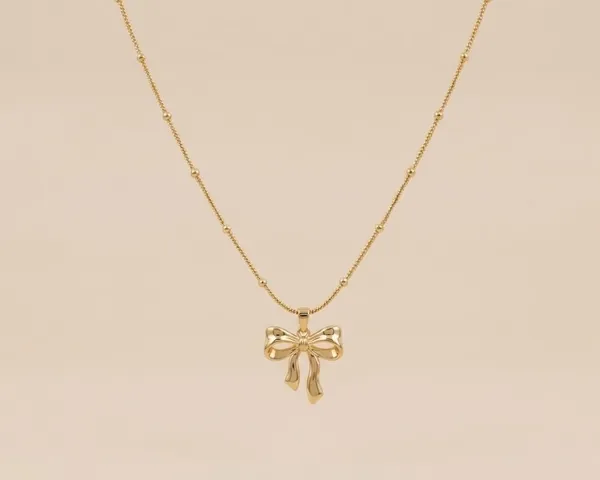 Gold_Stainless_Steel_Bow_Pendant_Necklace_For_Women_(PNSS-35)