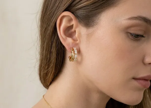 Gold_Metal_Wavy_Cubic_Zirconia_Hoop_Earrings_For_Women_(ERAD-05)