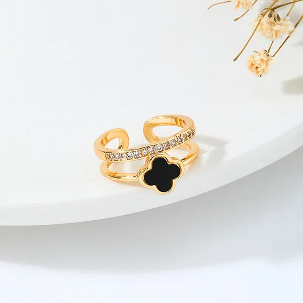Gold_Stainless_Steel_Adjustable_Black_Clover_Ring_For_Women_(RGSS-28)