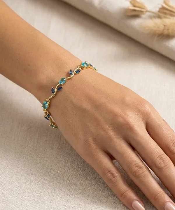 Gold_Metal_Blue_Topaz_Sapphire_Studded_Chain_Bracelet_For_Women_(BRADCN-04C)