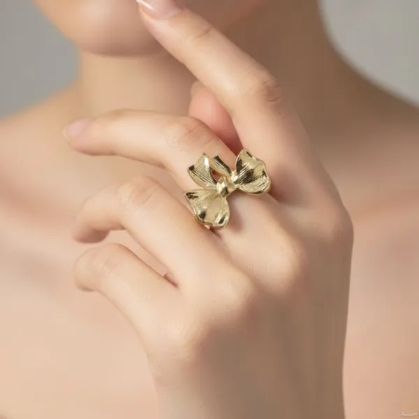 Gold_Stainless_Steel_Bow_Design_Adjustable_Statement_Ring_For_Women_(RGSS-14)