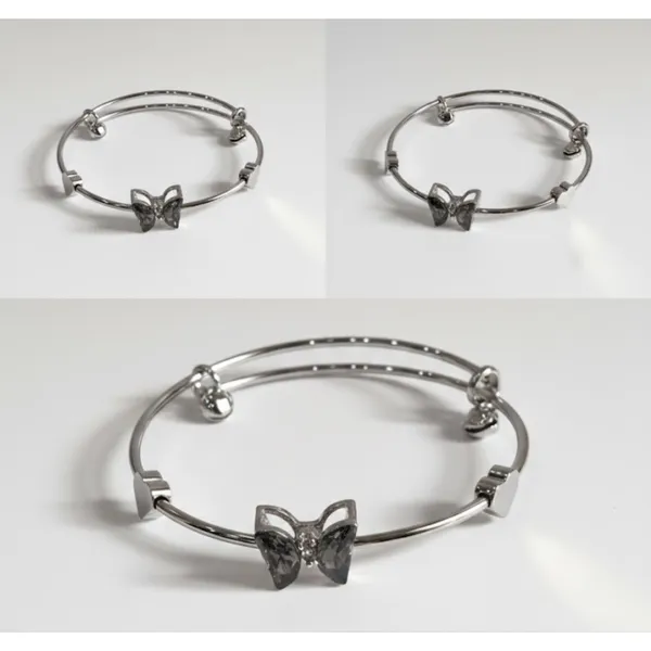 Silver_Stainless_Steel_Adjustable_Butterfly_Charm_Bracelet_For_Women_(BRSSCF-23)