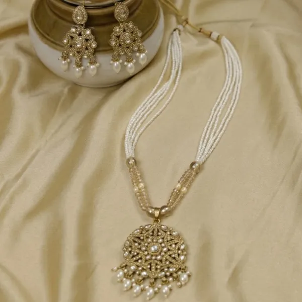 Aadhya_Kundan_&_Multi-Strand_Pearl_Necklace_With_Statement_Earrings